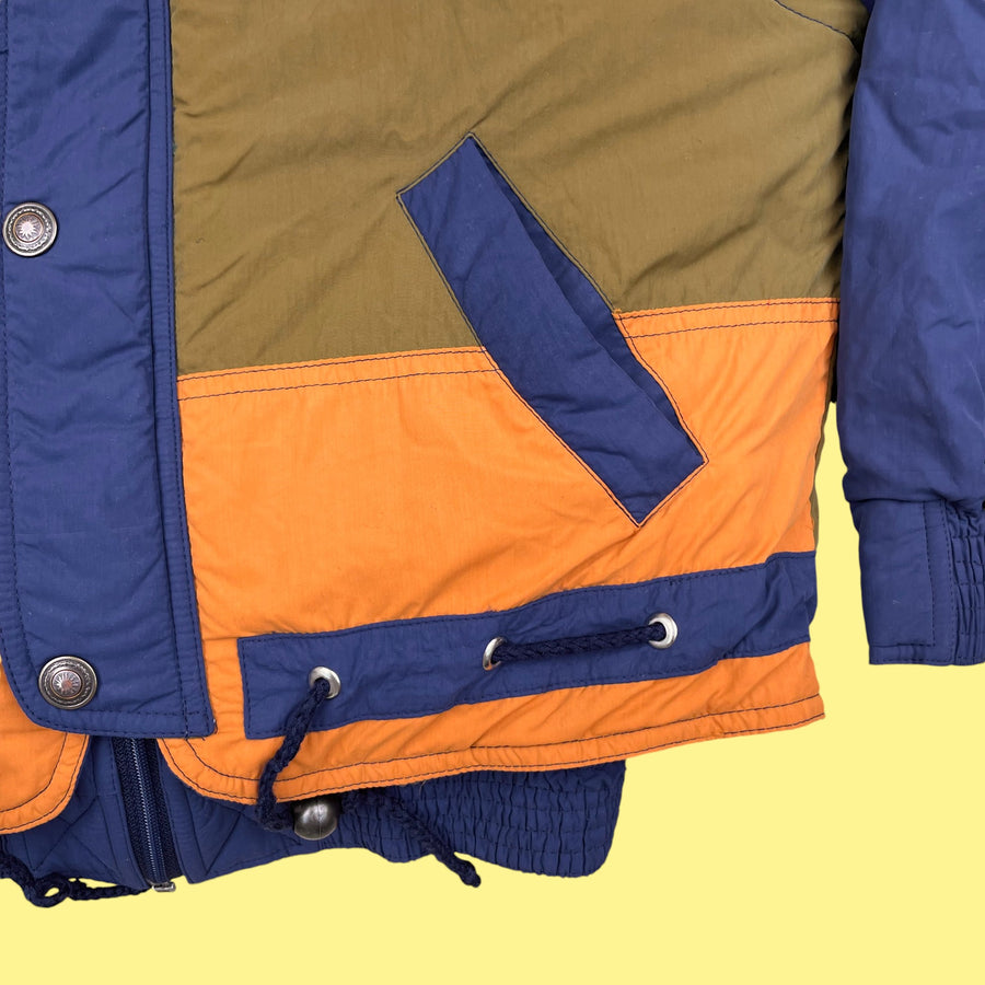 Manteau neuf de stock bleu 7-8 ans