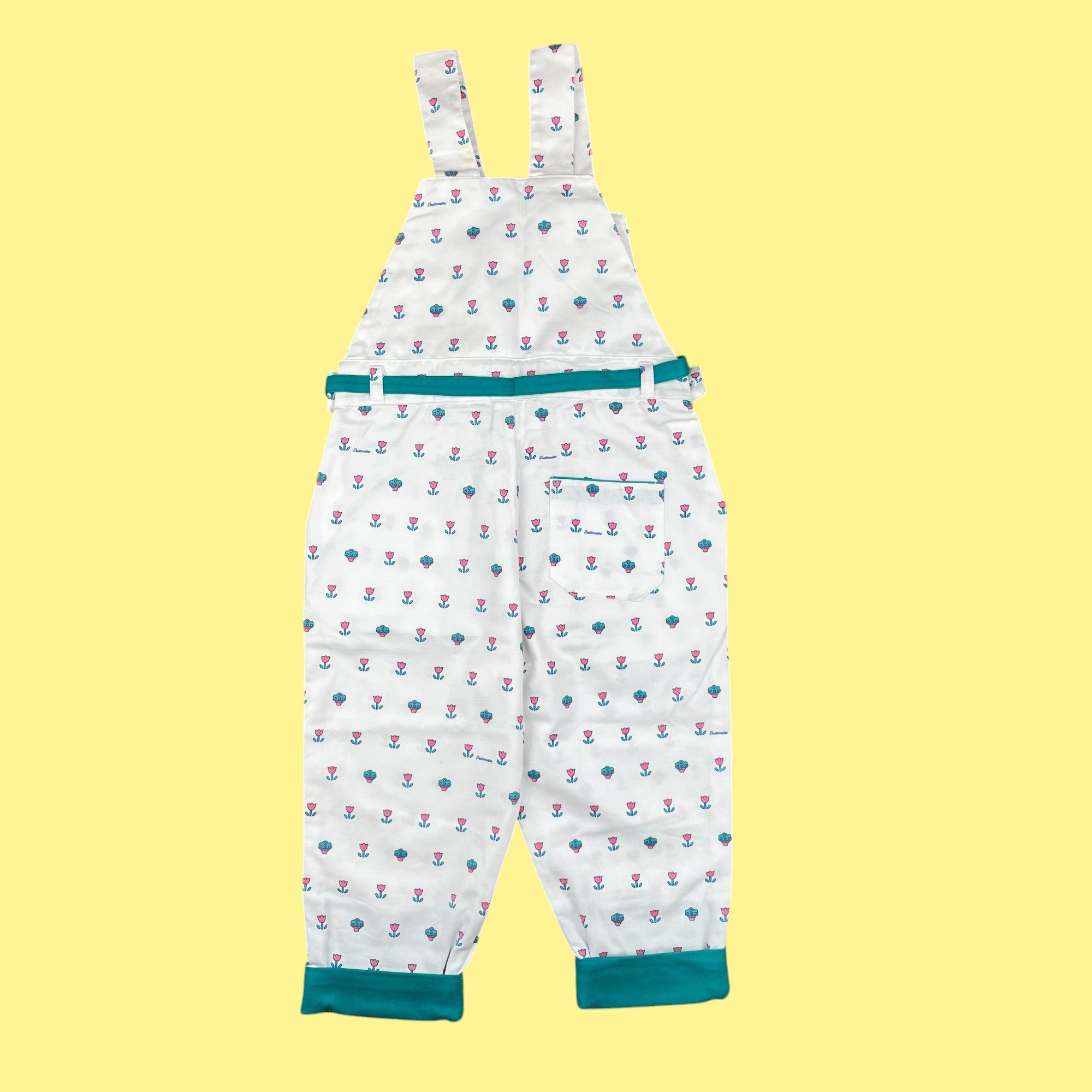 Salopette fleurie neuve 3-4 ans