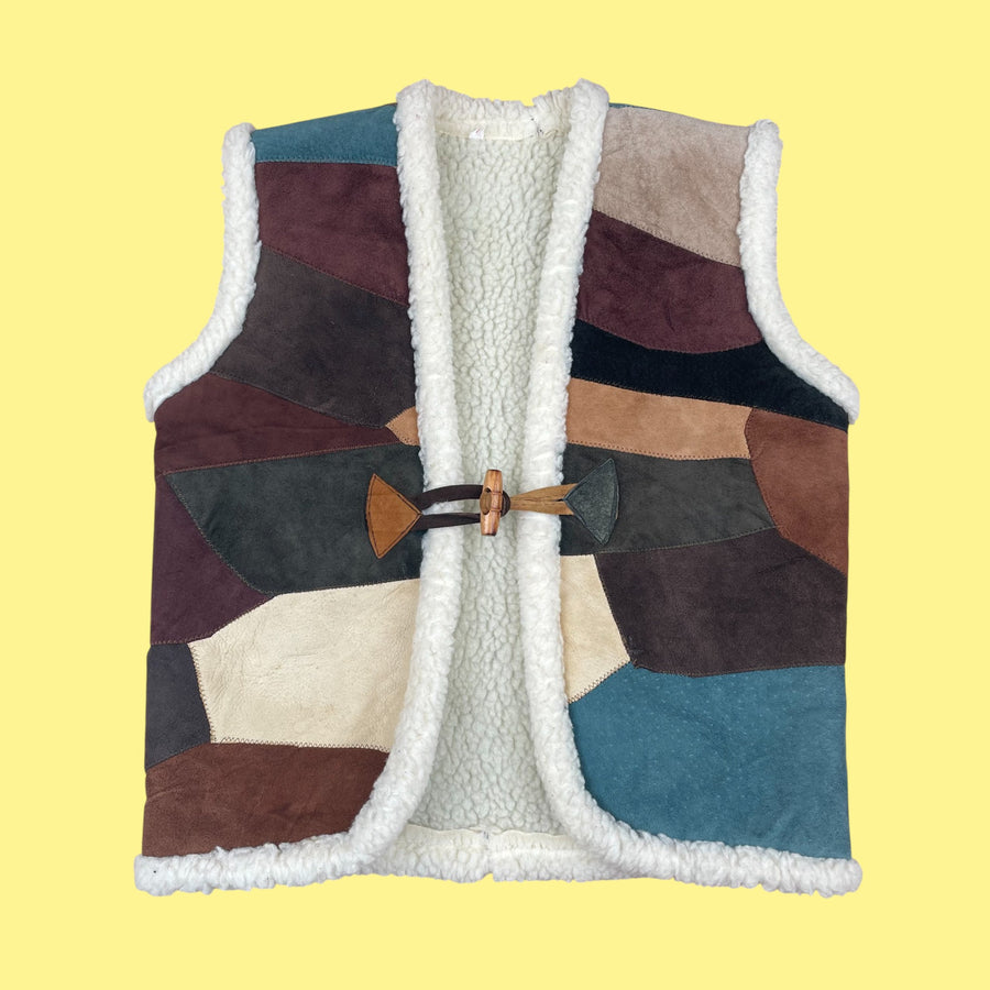 Gilet sans manches cuir 6-8 ans