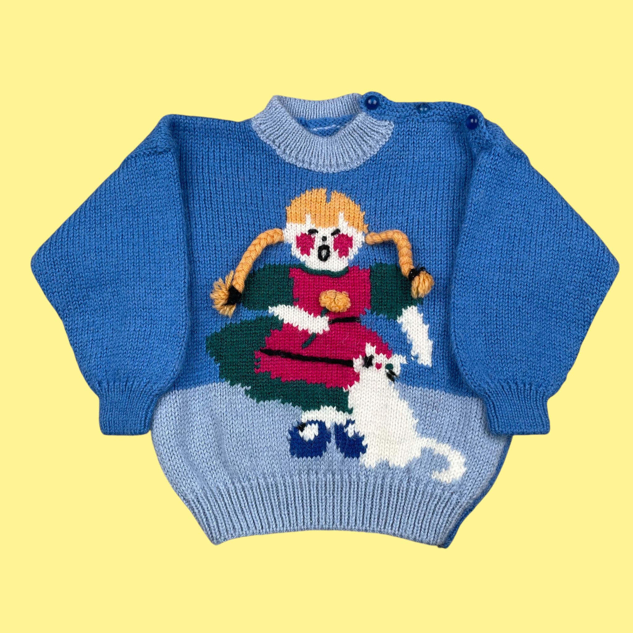 Pull fait main tresses 2 ans