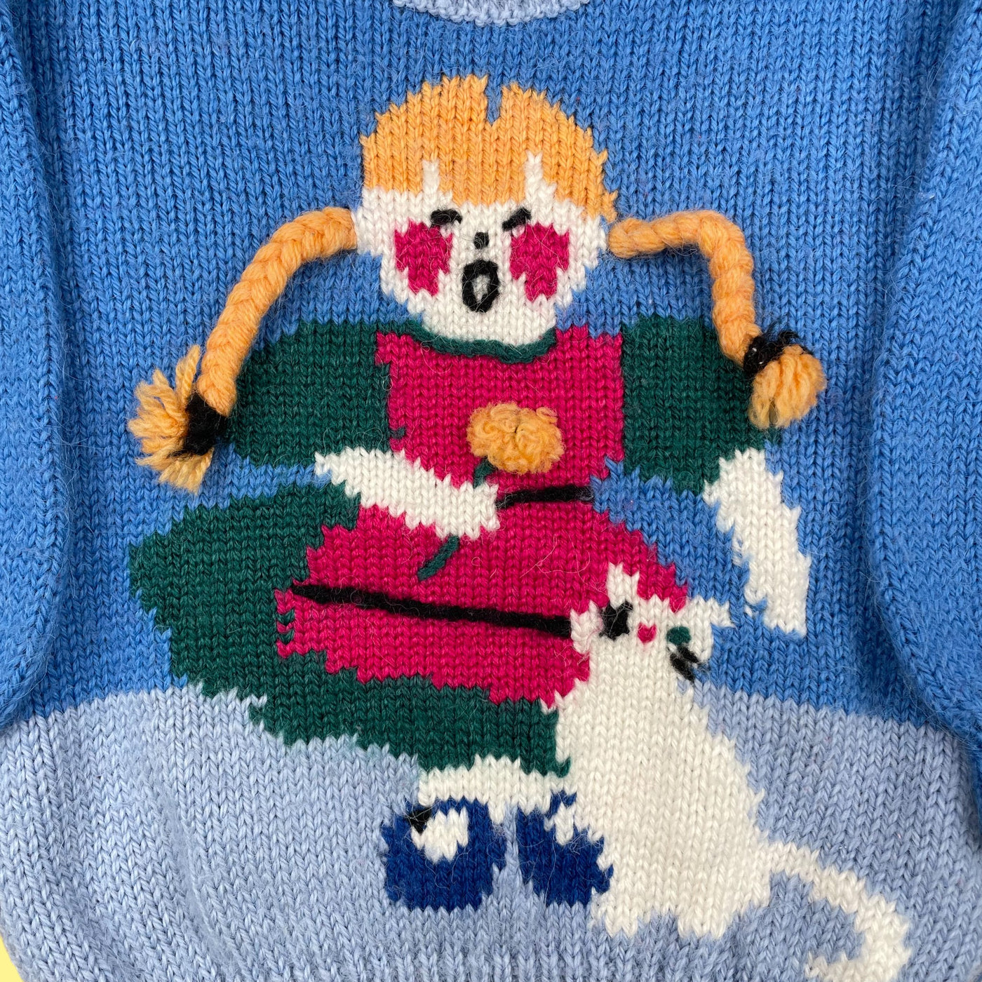 Pull fait main tresses 2 ans