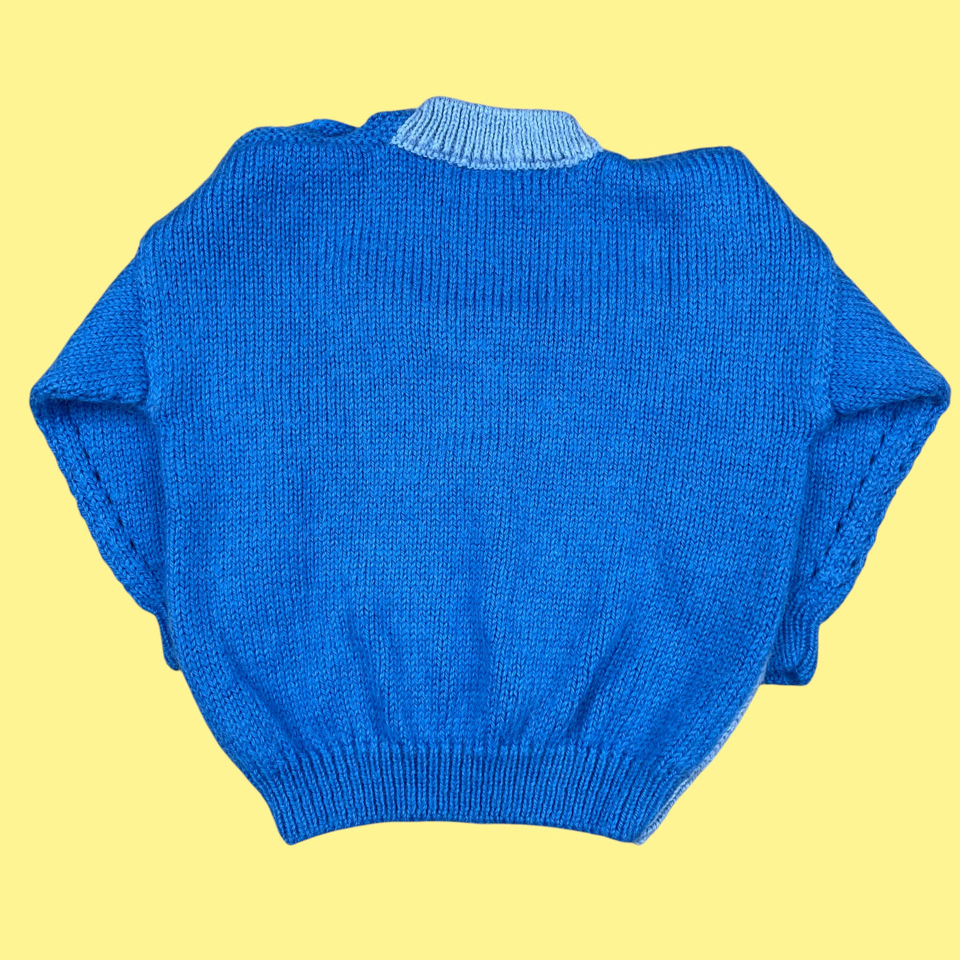 Pull fait main tresses 2 ans