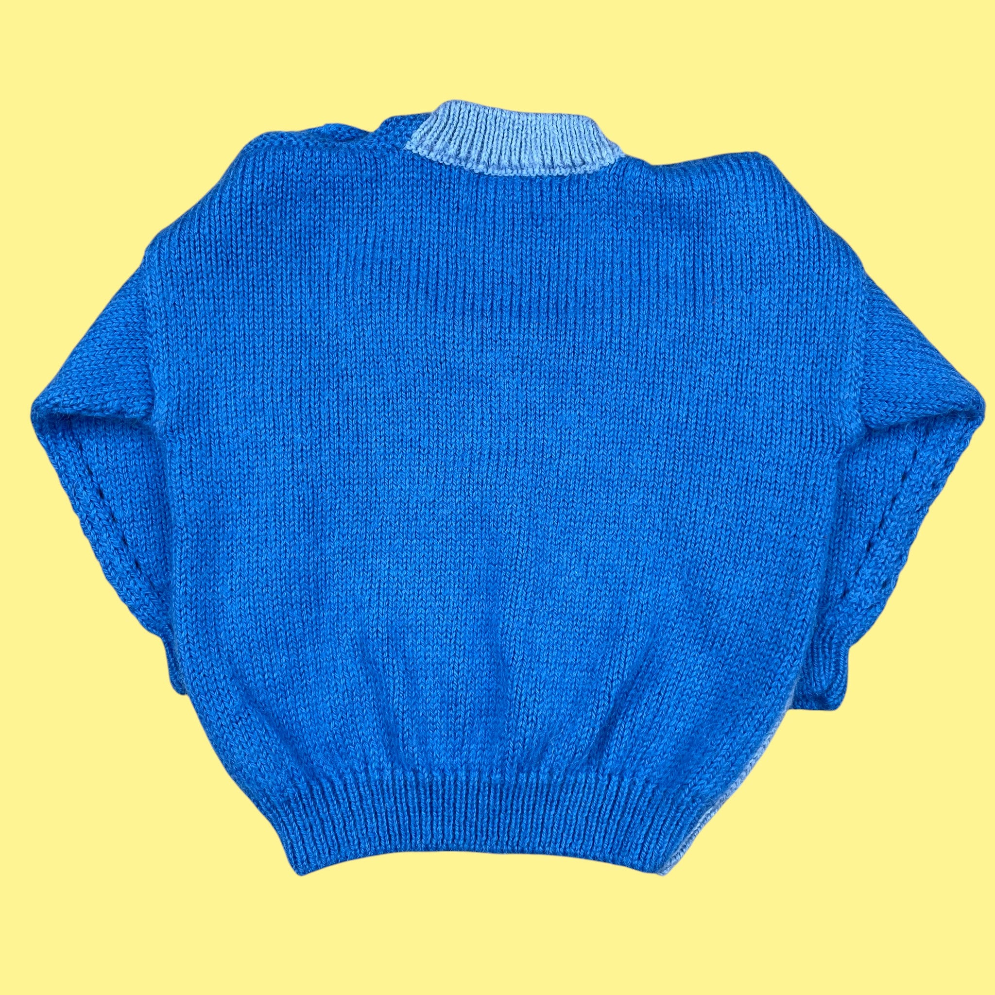 Pull fait main tresses 2 ans
