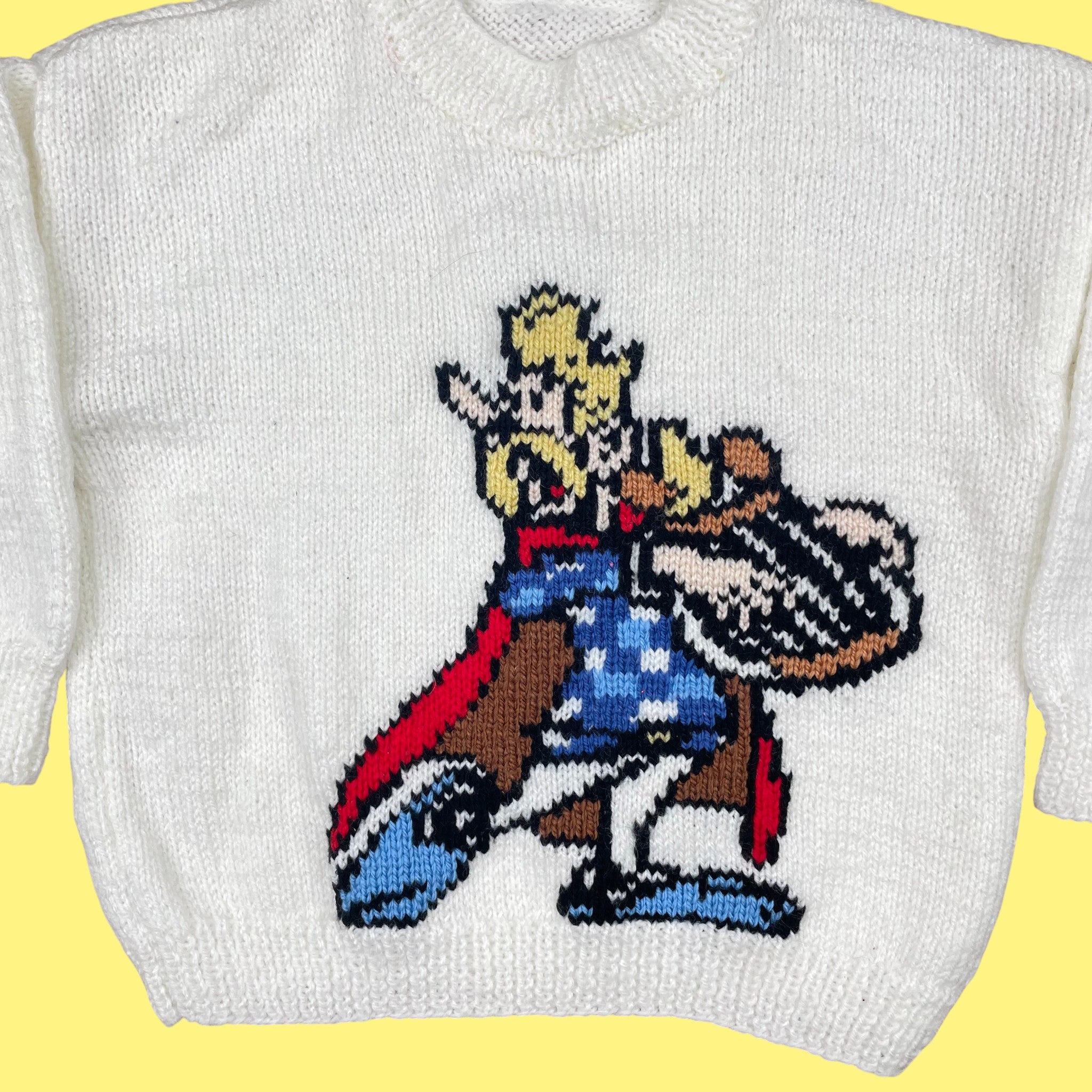 Pull fait main Assurancetourix 2-3 ans